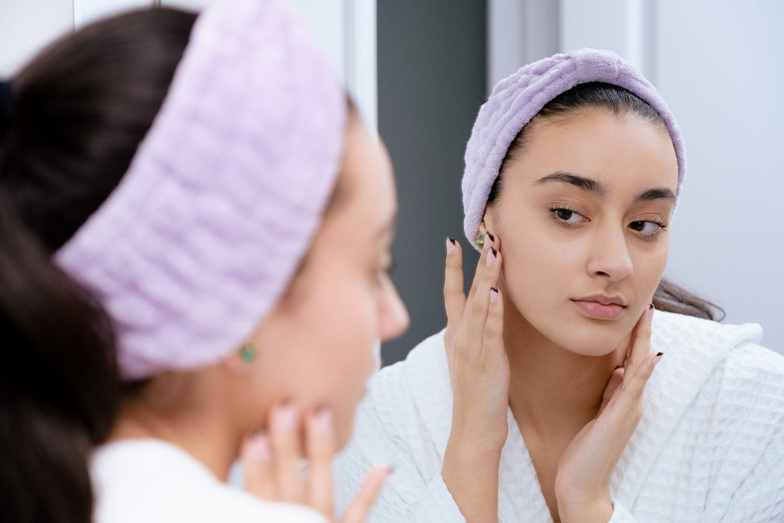 a women looking fabulous after a lymphatic face drainage . face sculpted and firmer 